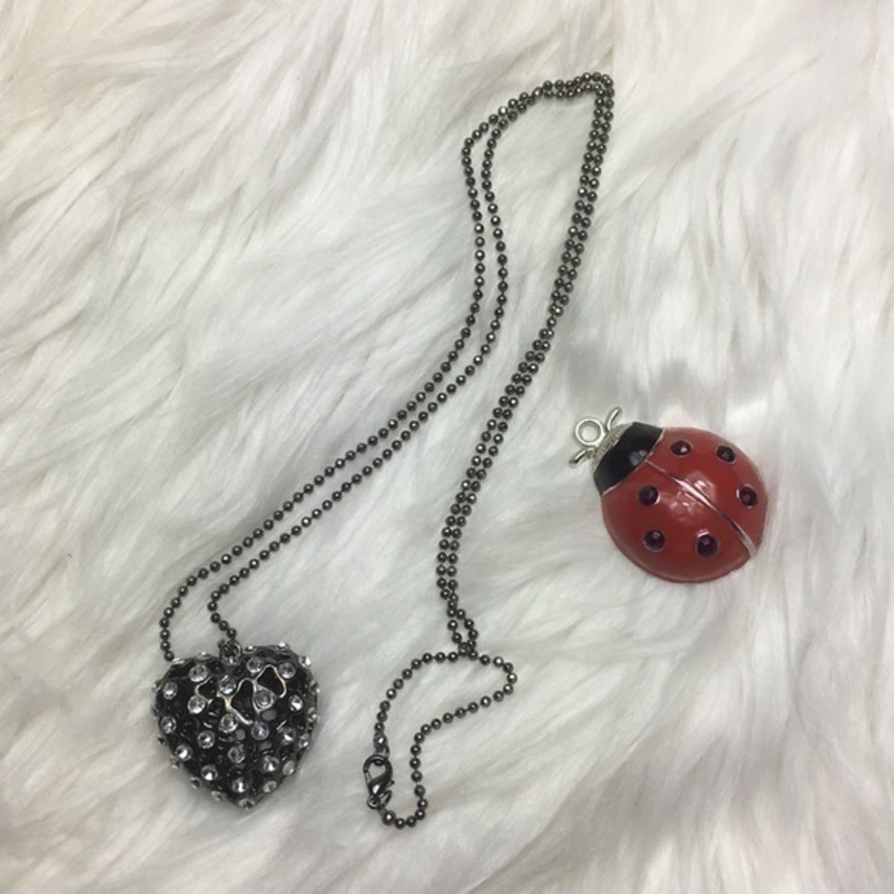 3-D bejeweled heart, 32” long necklace, GUC.